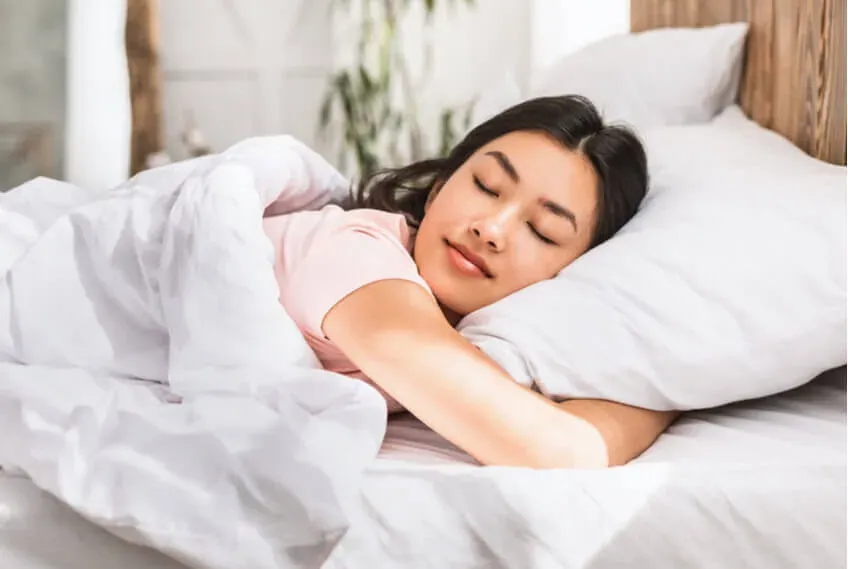 woman sleeping in bed